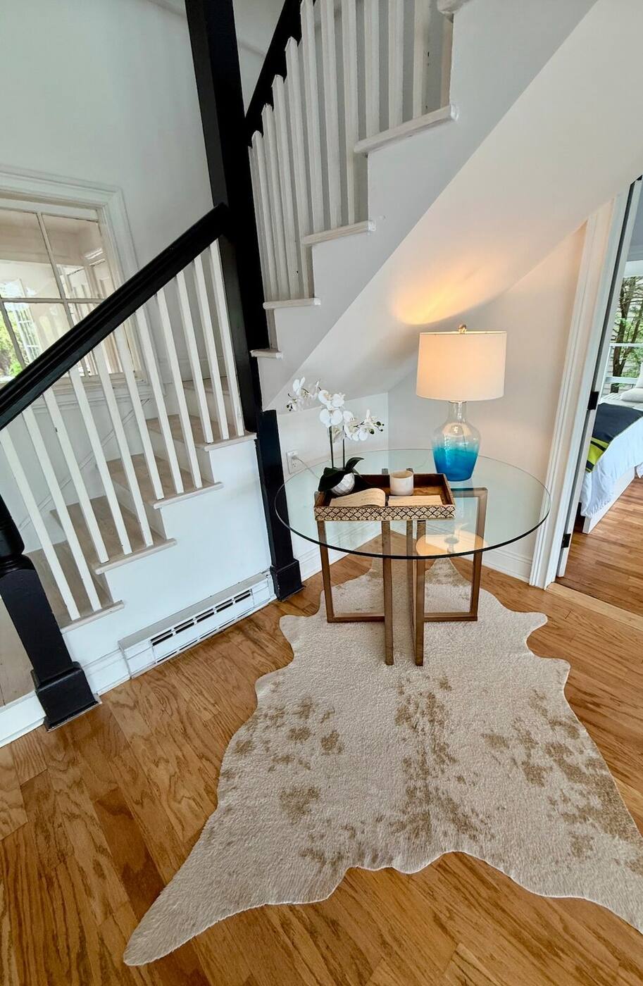 Ocean House historic foyer entrance with hardwood floors — century-old oceanfront villa, Long Island NY